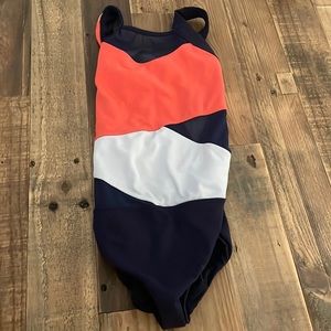 This is a multicolored leo from Five Dance-wear. It’s a size YXL.